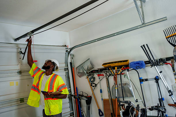Professional Garage Door Panel Replacement technician working in Huntland, TN